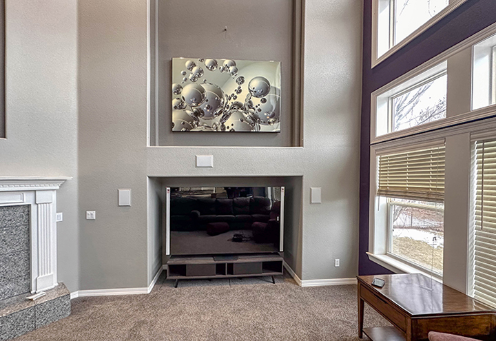 Grey purple painted living room. Painting of walls is new and fresh.