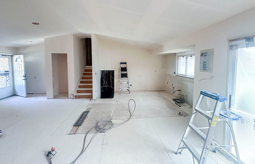 Image of home family room being prepared for wall painting.